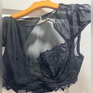 Free people lace blouse.  Color-black.  Size-M